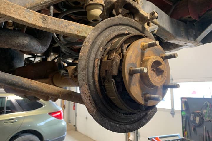 2009 Jeep Wrangler oil contaminated parking brake repair Whitmore Lake MI