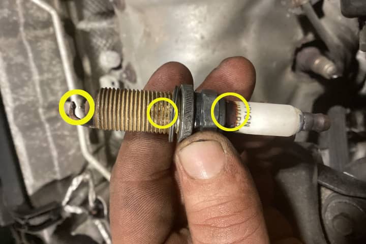 2014 Jeep Cherokee worn spark plug
